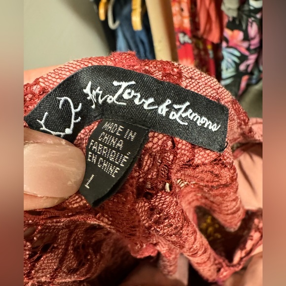 For love and lemons preowned size L but runs small - Picture 16 of 17